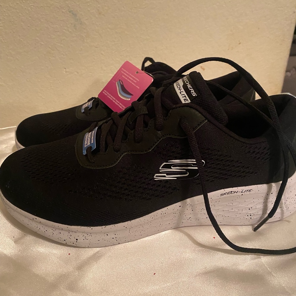 Size 10 black sneakers; memory foam Skechers; wide fit